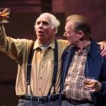 John Barrymore, played by Peter DeLaurier, right, and Joe, played by Mike Peterson,share a drink during Perseverance Theatre&rsquo;s production of Joel Bennett&rsquo;s &ldquo;Dreaming Glacier Bay&rdquo; on Tuesday, Oct. 25, 2017. (Michael Penn | Capital City Weekly)