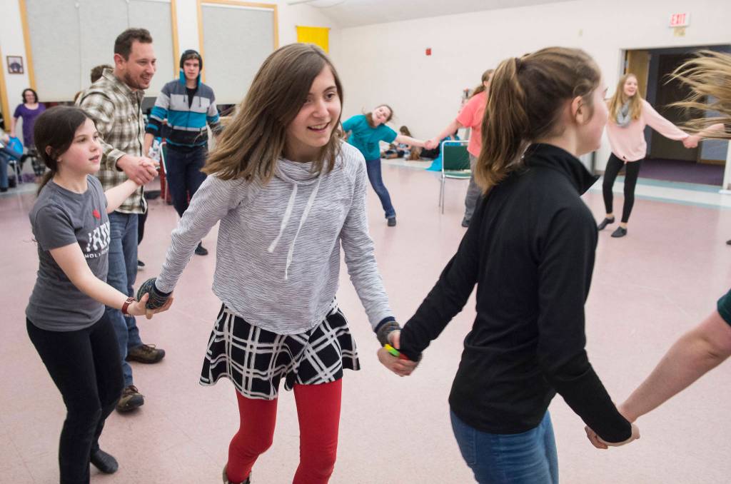 Front: Dori Germain, Nakenna Kotlarov, and Grace Hudson. Back: Andrew Bogar, Cody Pierce, Madeline Germain, Katlyn Fergusson, Sadie Jenkins. Rehearsal of Latitude 58&rsquo;s production of &ldquo;Fiddler on the Roof&rdquo; at St. Ann&rsquo;s Hall on Thursday, Nov. 9, 2017. (Michael Penn | Capital City Weekly)