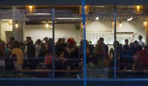 Amalga Distillery sports a full house during First Friday on Oct. 6, 2017. (Michael Penn | Juneau Empire)