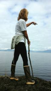 Megan Duncanson pointing toward bubble feeding humpback whales last summer, when she became determined to buy an island in Meyers Chuck. Photo by Tara Neilson.
