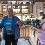 Sandy Frickey , left, talks about new assistive technology being used at home to help Frickey&rsquo;s daughter, Gina, be safe. (Michael Penn | Juneau Empire)