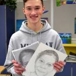 Thunder Mountain High School senior Michael Julson poses with a portrait he made as part of the Memory Project. The project sends portraits to children in distress all over the world, giving them a keepsake. (Photo courtesy of Angela Imboden)