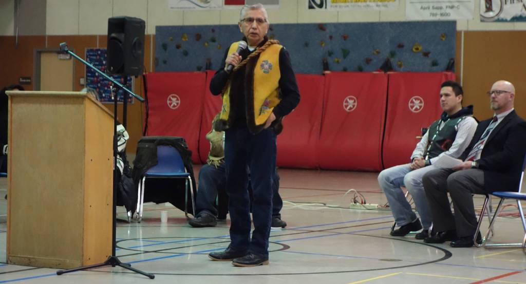 Paul Marks of the Lukaax.adi clan addresses the students at the &ldquo;Transfer of Core Cultural Values Panels Ceremony&rdquo; at Floyd Dryden Middle School on Wednesday, Nov. 22. (Clara Miller | Capital City Weekly)