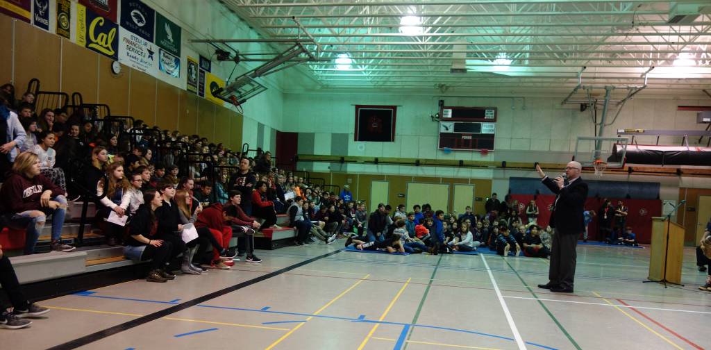 Principal Jim Thompson addresses students at the &ldquo;Transfer of Core Cultural Values Panels Ceremony&rdquo; at Floyd Dryden Middle School on Wednesday, Nov. 22. (Clara Miller | Capital City Weekly)