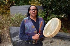 Dennis Zotigh poses for a photo outside the National Museum of the American Indian in Washington, Friday, Nov. 3, 2017. Many tribes even have their own national anthems known as flag songs that focus on veterans. They&rsquo;re popular among Plains tribes from which the modern powwow originated, said Zotigh of the Smithsonian National Museum of the American Indian. Powwows are social gatherings, generally with competitive dancing. (Susan Walsh | The Associated Press)