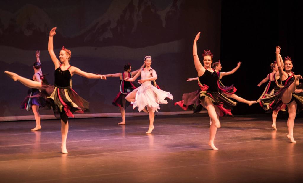 Polaris and the northern lights spin, greeting Marie as she arrives in Alaska. Polaris is played by Mattey Stroemer. Photo by Bobbi Jordan.