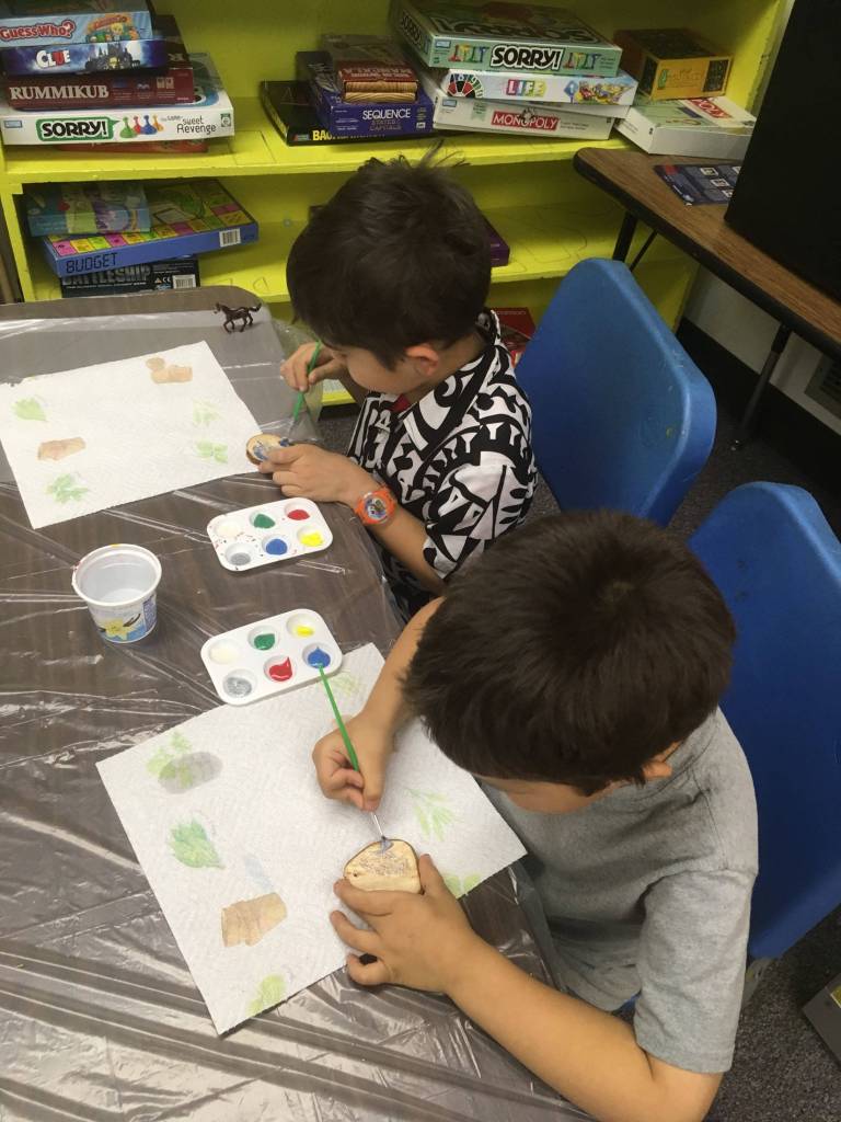 Kids at the Yakutat Community Health Center create ornaments for the inaugural &ldquo;Good Neighbor Tree,&rdquo; currently on display at the Governor&rsquo;s mansion. The ornament-making was led by counselors Milo Valle and Nichole Rowley of the Yakutat Tlingit Tribe. Residents of the Juneau Pioneer Home also made ornaments for the tree. Images courtesy of the U.S. Forest Service.