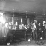 This photo served as the cover to the first edition of Douglas Vandegraft&rsquo;s &ldquo;A Guide to the Notorious Bars of Alaska.&rdquo; &ldquo;Bar in Douglas, AK, 1908&rdquo; P39-0802 Copyright Alaska State Library Case & Draper Photograph Collection