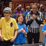 A team watches as their robot performs small tasks during a competition at the Juneau Robot Jamboree at Centennial Hall Convention Center on Saturday. (Kevin Gullufsen | Juneau Empire)