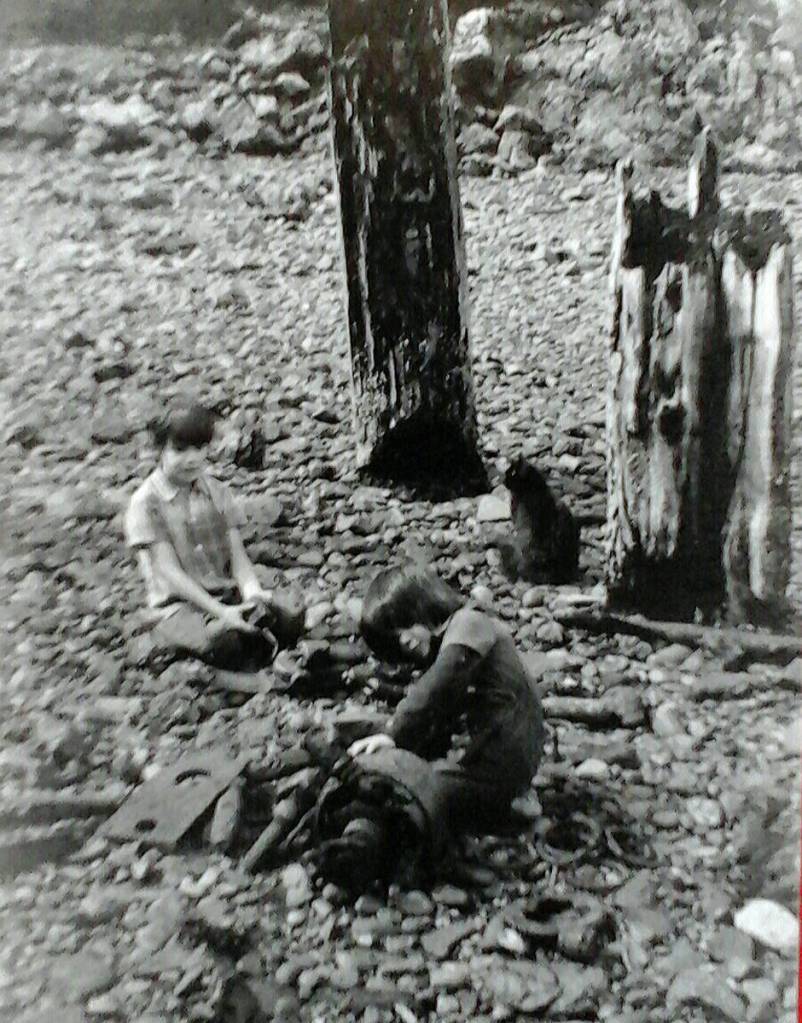The barefoot boys, the author&rsquo;s brothers Robin (left) and Chris (right) playing in the cannery ruins. Courtesy of Tara Neilson.