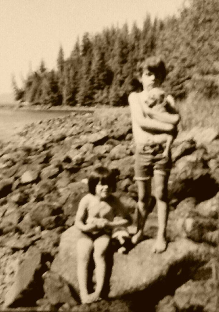 The barefoot boys, Chris (left) and Robin (right) with a couple of our twenty-plus dogs. Photo courtesy of Tara Neilson.