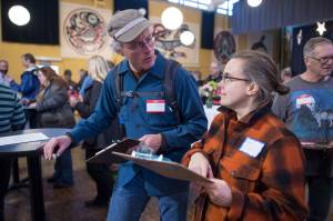 Engineer Jim Rehfeldt trades information with Glacier Valley Elementary Teacher Mareta Weed during a networking event for teachers and STEM community members at the Juneau Arts and Culture Center on Tuesday, Oct. 17, 2017. The SouthEast Exchange is a new collaboration started by scientists and school teachers, in conjunction with the Juneau STEM Coalition and JEDC. Its broad mission is to share ideas, experience and knowledge within our community and, particularly, to facilitate connections among professionals and teachers to enrich education for Juneau students. (Michael Penn | Juneau Empire File)