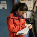 Claire Wilcox, a senior at Mount Edgecombe High School, records data from a salmon stomach. Photo by Amelia Greenberg | For the Capital City Weekly