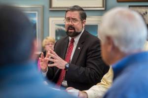 Michael Keays, U.S. Consul General stationed in Vladivostok, Russia, introduces himself during a meeting at City Hall on Thursday, Dec. 28, 2017. Keays, halfway through a three year assignment in Vladivostok, is touring Alaska cities to meet with Sister City committees and to voice opportunities to U.S. citizens and business in Russia&rsquo;s Far East. (Michael Penn | Juneau Empire)