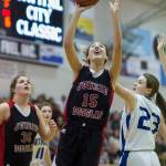 Juneau-Douglas&rsquo; Janae Pusich shoots against Sutherlin&rsquo;s Sydnee Tilley during their Capital City Classic Basketball Tournament game at JDHS on Thursday, Dec. 28, 2017. (Michael Penn | Juneau Empire)