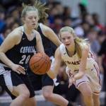 Juneau-Douglas&rsquo; Sadie Tuckwood, right, drives against Chugiak&rsquo;s Caitlin Wachmann during their Capital City Classic Basketball Tournament game at JDHS on Saturday, Dec. 30, 2017. (Michael Penn | Juneau Empire)