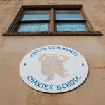 Principal Caron Smith, right, and Math Specialist Brenda Taylor talk about the Juneau Community Charter School on Wednesday, Jan. 10, 2018. The school is celebrating its 20th Anniversary with a dinner and presentation in the Juneau-Douglas High School commons on Saturday from 5:30 to 9 p.m. (Michael Penn | Juneau Empire)