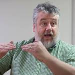 Patrick Sidmore, a health planner for the Alaska Mental Health Board, talks on Tuesday, Jan. 9, 2018, about new studies in addressing emotional trauma in young students. (Michael Penn | Juneau Empire)