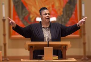 Sherry Patterson, president of the Black Awareness Association, gives the keynote address to Juneau residents during the Dr. Martin Luther King Jr. 2018 Community Celebration sponsored by the Black Awareness Association at St. Paul&rsquo;s Catholic Church on Monday, Jan. 15, 2018. (Michael Penn | Juneau Empire)