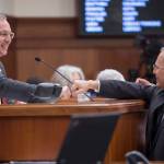 Speaker of the House Bryce Edgmon, D-Dillingham, left, receives a fist bump from Rep. Mark Neuman, R-Big Lake, as legislators return to Alaska&rsquo;s Capitol to open the Second Session of the 30th Legislature on Tuesday, Jan. 16, 2018. (Michael Penn | Juneau Empire)