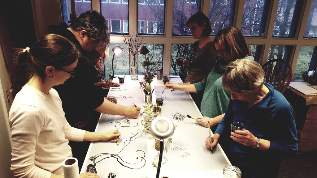 Students in a Sumi Painting class at Color Wheel Arts. Image courtesy of Sherri McDonald.