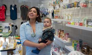 Jessica Burns, holding her 10-month-old son, Avery, in her new shop called &ldquo;Momma Says&rdquo; on Wednesday, Jan. 17, 2018. The shop, located in the Juneau Family Health and Birth Center, carries maternity and baby products for mothers before and after they give birth. (Michael Penn | Juneau Empire)