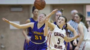Juneau-Douglas&rsquo; Kiana Potter, right, battles for a loose ball against Lathrop&rsquo;s Ella Roberts at JDHS on Friday, Jan. 19, 2018. JDHS won 57-53. (Michael Penn | Juneau Empire)