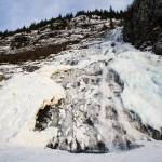 In this Dec. 2016 photo, a partially-frozen Nugget Falls at Mendenhall Lake. (Michael Penn | Juneau Empire File)
