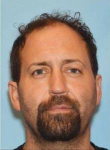 The Juneau Police Department arrested 42-year-old Seth Martin Timmer, pictured, on Tuesday morning. Timmer was charged with third-degree assault and might be connected with a recent vehicle theft. (Courtesy photo | Juneau Police Department)