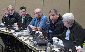 The Alaska Marijuana Control Board meets in Juneau on Wednesday, Jan. 24. Sitting from far left are members Loren Jones, Brandon Emmett, Nicholas Miller, Travis Welch and Mark Springer. Springer was elected board chairman on Wednesday and Emmett was elected vice chair. (Becky Bohrer | Associated Press)