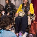Heather Lee, right, and Michael George Patterson receive foot care during the Juneau Coalition on Housing & Homelessness&rsquo; 7th annual Project Homeless Connect in the Juneau Arts & Culture Center on Wednesday, Jan. 24, 2018. (Michael Penn | Juneau Empire)