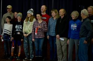 The second-place finishers in the Nugget Alaskan Outfitter Cup Series pose for a picture at the Juneau Trail and Road Runners potluck and awards ceremony Saturday, Jan. 27, at the Juneau Arts and Culture Center. (Nolin Ainsworth | Juneau Empire)