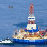 In this Jan. 7, 2013 photo, a U.S. Army CH-47 Chinook helicopter flies over the Kulluk, the Shell floating drilling barge off Kodiak Island in Alaska&rsquo;s Kiliuda Bay, as salvage teams conduct an in-depth assessment of its seaworthiness. Citing the disappointing results from an exploratory well in 2015, and challenging and unpredictable federal regulatory environment, Shell abandoned drilling in U.S. Arctic waters. The Trump administration is pursuing petroleum lease sales in Arctic waters but an analyst says potential bidders may find other areas more attractive. (James Brooks | Kodiak Daily Mirror File)