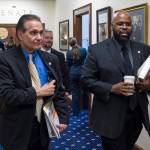 Sen. David Wilson, R-Wasilla, right, walks out of the Senate chambers on Monday, Jan. 29, 2018, with Sen. Kevin Meyer, R-Anchorage. (Michael Penn | Juneau Empire)