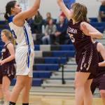Thunder Mountain&rsquo;s Kira Frommherz, left, has her shot blocked by Ketchikan&rsquo;s Kaitlyn Smith during their game at TMHS on Friday, Feb. 2, 2018. (Michael Penn | Juneau Empire)