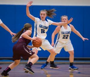 Thunder Mountain&rsquo;s Samantha Dilley, center, guards Ketchikan&rsquo;s Madison Rose during their game at TMHS on Friday, Feb. 2, 2018. (Michael Penn | Juneau Empire File)