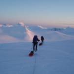 Ed Shanley and Dennis Hall ski along the northern side of the Taku Range on the Juneau icefield. (Photo by Bjorn Dihle)