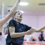 Thunder Mountain High School&rsquo;s Luke Clark tries to score around Juneau-Douglas High School&rsquo;s Erik Kelly at JDHS on Friday, Feb. 2, 2018. The Falcons, who have played the last 11 games on the road, host Mt. Edgecumbe High School on Friday at 8 p.m. and Saturday at 6 p.m. (Michael Penn | Juneau Empire File)