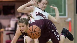 Juneau-Douglas&rsquo; Kiana Potter fouls Ketchikan&rsquo;s Madison Rose at JDHS on Friday, Feb. 16, 2018. (Michael Penn | Juneau Empire)