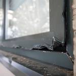 One of four windows that show damage on the backside of Dzantik&rsquo;i Heeni Middle School on Monday, Feb. 19, 2018. (Michael Penn | Juneau Empire)