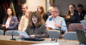 Elaine Schroeder speaks to the Board of Trustees of the Alaska Permanent Fund Corporation on divesting from fossil fuel investments during public testimony at its Quarterly Meeting in Juneau on Wednesday, Feb. 21, 2018.