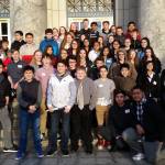 Students visiting the Capitol pose with members of the League of Women Voters. Courtesy image.