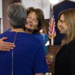 U.S. Sen. Lisa Murkowski, R-Alaska, center, is greeted by Sen. Anna MacKinnon, R-Eagle River, left, and Sen. Mia Costello, R-Anchorage, after her speech to a joint session of the Alaska Legislature at the Capitol on Thursday, Feb. 22, 2018. (Michael Penn | Juneau Empire)