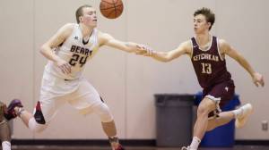 Juneau-Douglas&rsquo; Erik Kelly, left, attempts a steal from Ketchikan&rsquo;s Cody Kemble at JDHS on Wednesday, Feb. 21, 2018. JDHS won 59-41 on Wednesday but lost 81-69 on Thursday. (Michael Penn | Juneau Empire)