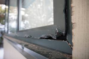 One of four windows that show damage on the backside of Dzantik&rsquo;i Heeni Middle School on Monday, Feb. 19, 2018. (Michael Penn | Juneau Empire)