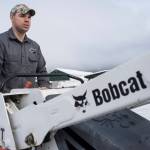 Colter Boehm, service manager for Bobcat of Juneau, works in his company&rsquo;s yard on Friday, Feb. 23, 2018. (Michael Penn | Juneau Empire)