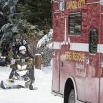 Capital City Fire/Rescue firefighter Blake Fleming and other members of CCFR&rsquo;s rescue team arrive at the Spaulding Meadows snowmachine trail with a man rescued from the John Muir Cabin on Wednesday, Feb. 28, 2018. The man was said to have had a medical issue. Juneau Snowmobile Club members helped in the rescue. (Michael Penn | Juneau Empire)