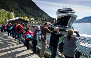 In this August 2015 photo, visitors line up to view Juneau&rsquo;s downtown harbor. (Michael Penn | Juneau Empire File)
