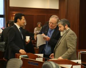 From left to right, Rep. Neal Foster, D-Nome, Rep. Mike Chenault, R-Nikiski, and Rep. Sam Kito III, D-Juneau, are seen during an at-ease during Wednesday&rsquo;s floor session of the Alaska House of Representatives. (Mike Mason | Alaska House Majority)