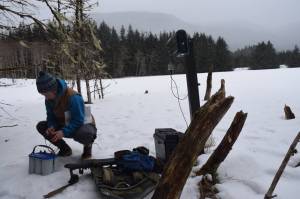 Alaska Department of Fish and Game Wildlife Biologist Tory Rhoads checks on a bat monitoring station at Fish Creek on Friday. Bat researchers across the country fear the spread of the deadly White nose syndrome, a fungal infection which has decimated bat populations in eastern states and has recently been found in Washington state. (Kevin Gullufsen | Juneau Empire)